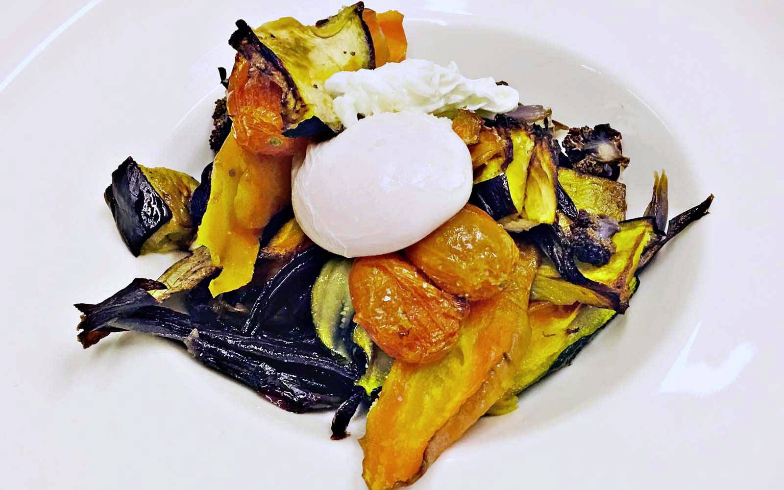 Roasted vegetable salad and poached egg